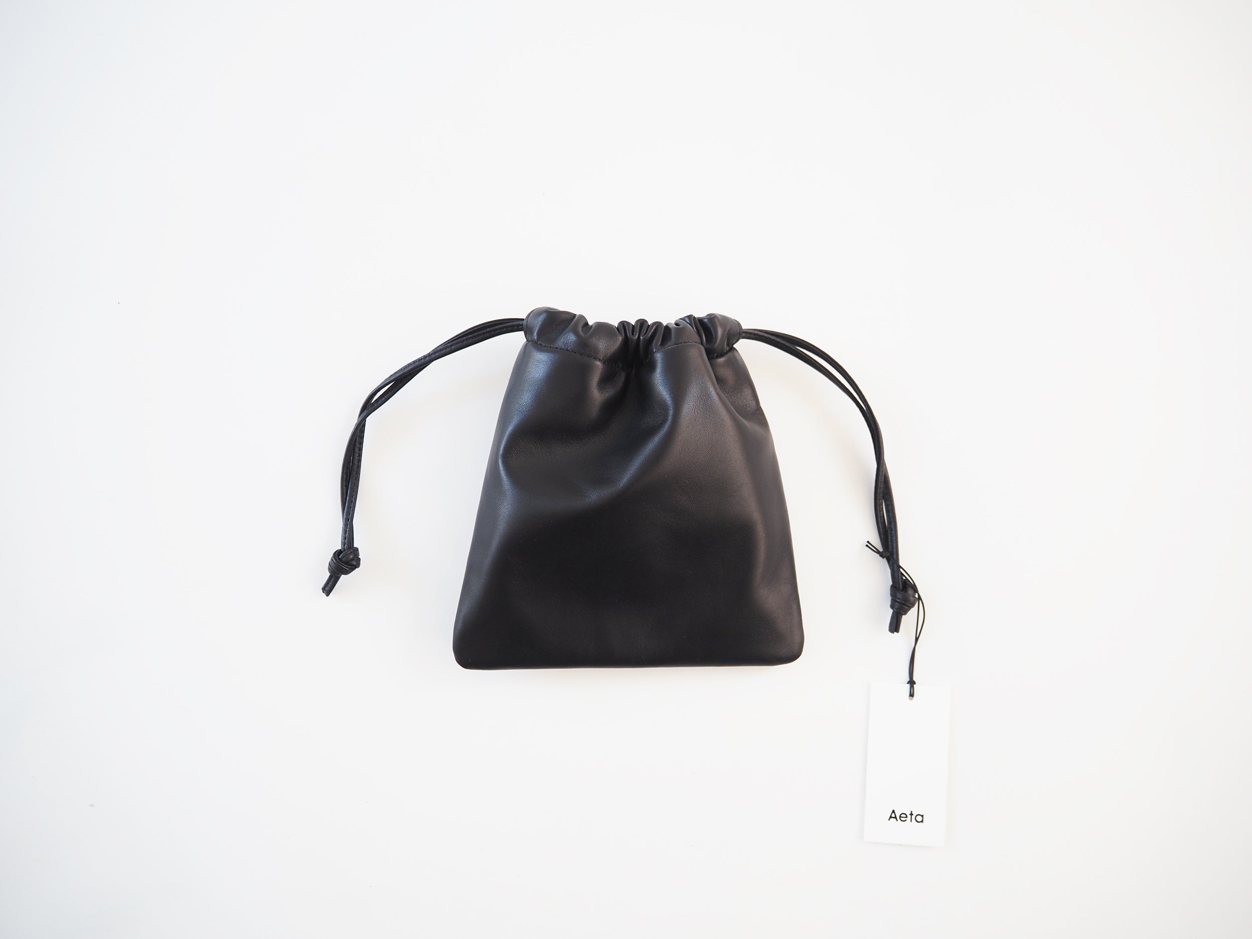 Leather drawstring best sale pouch bag